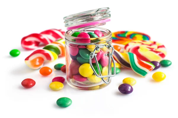 Colorful candy in a glass jar — Stock Photo, Image