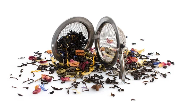 Herbal tea and tea strainer — Stock Photo, Image