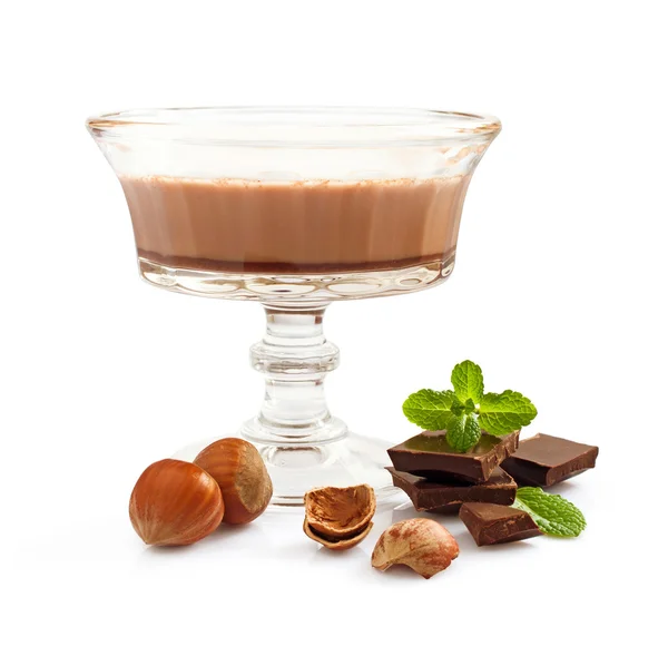 Chocolate mousse dessert with mint and hazelnuts — Stock Photo, Image