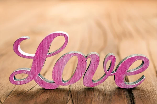 The wooden word love — Stock Photo, Image