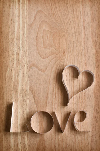 Paper heart and word "Love" — Stock Photo, Image