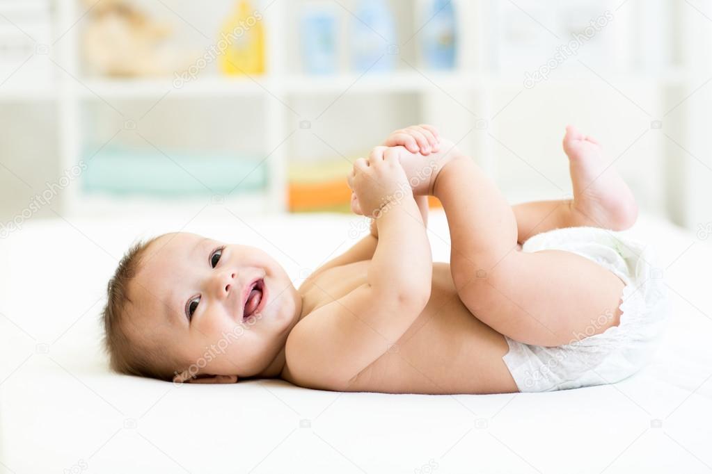 baby holding bed