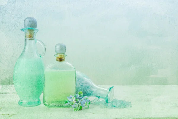 Painterly bottles of bath oil — Stock Photo, Image