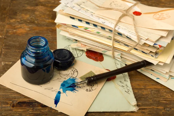 Blue ink and old letters — Stock Photo, Image