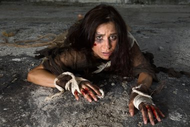 Horror scene with abused woman clipart