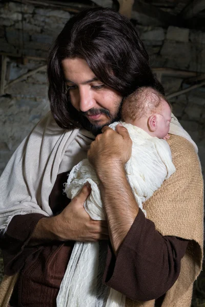 约瑟夫 · 拥抱婴儿耶稣 — 图库照片