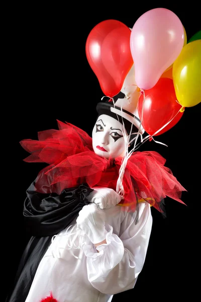Olycklig clown med ballonger — Stockfoto