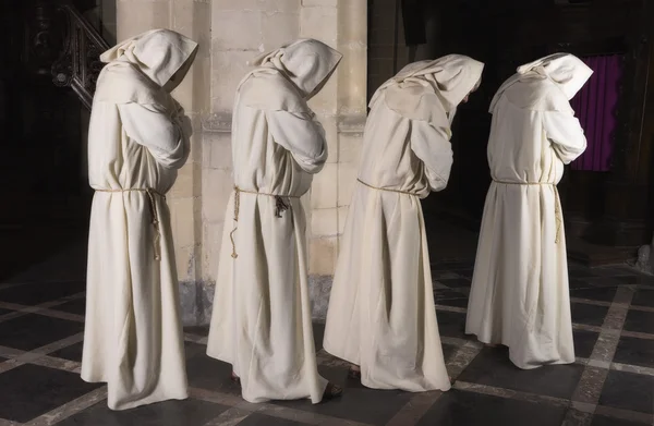 Four monks in a row — Stock Photo, Image