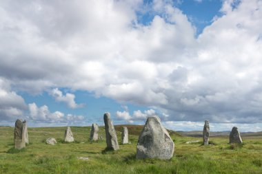 Scottish countryside with standing stones clipart