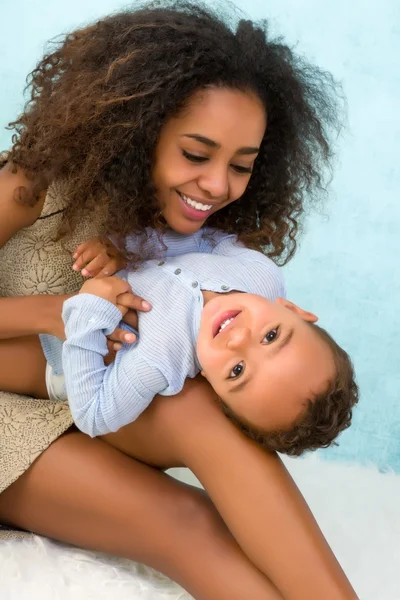 African mother and son playing — Stock Photo, Image