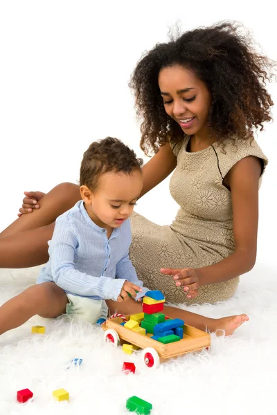 African toddler playing with blocks — Stock Photo, Image