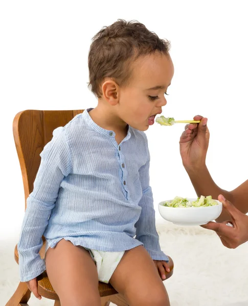 Boy disliking vegetables — Stock Photo, Image