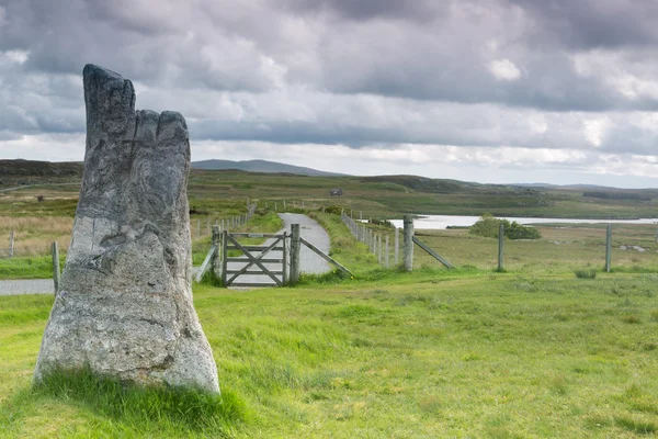 Sheep gate and standing stone — Stock Photo, Image
