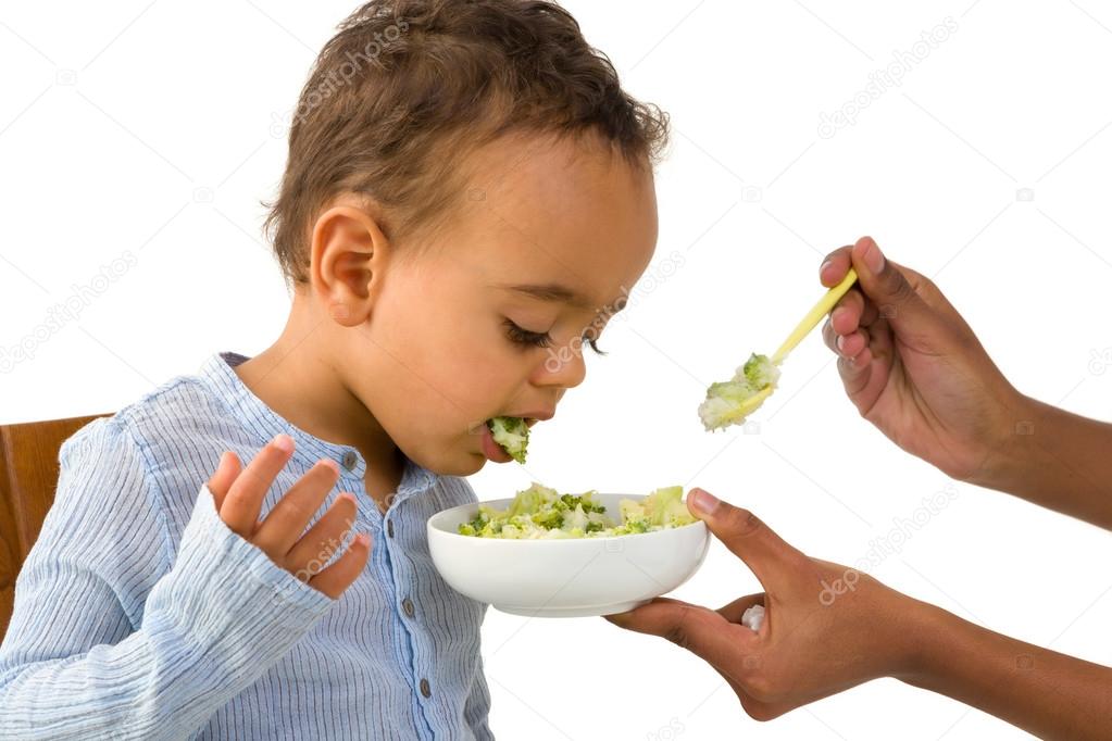 Toddler spitting out his vegetables