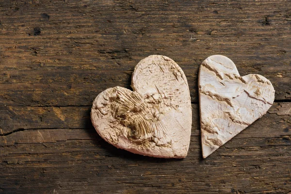 Wooden background with hearts — Stock Photo, Image