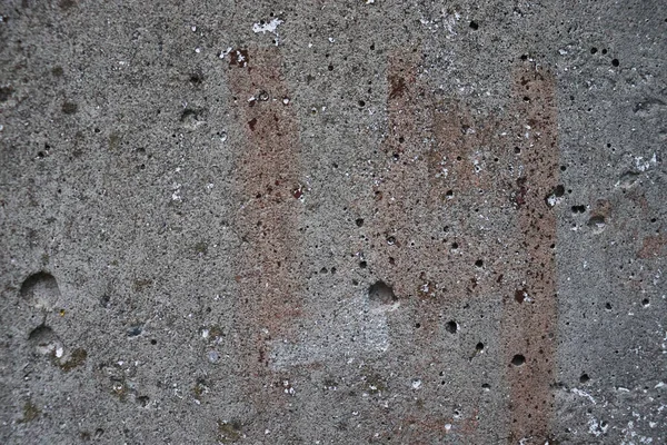 Concrete slab texture. Old cracked cement background. Gray scratched wallpaper