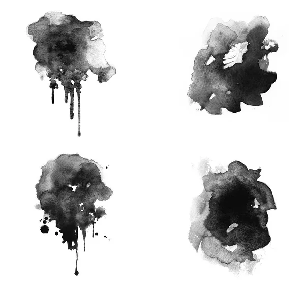 Siyah mürekkep lekeleri ve leke fırçaları.