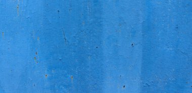 Eski demir duvarlarda eski boya lekeleri var. Metal yüzey dokusu arkaplanı