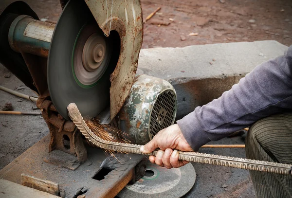 Polished steel workers are — Stock Photo, Image