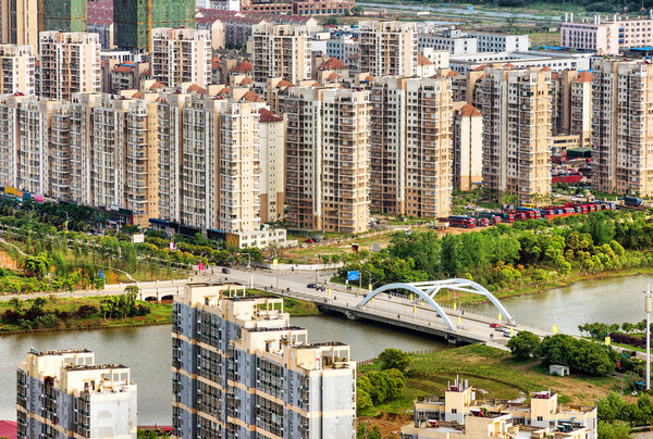 Aerial view of city buildings and river, China Nanchang.