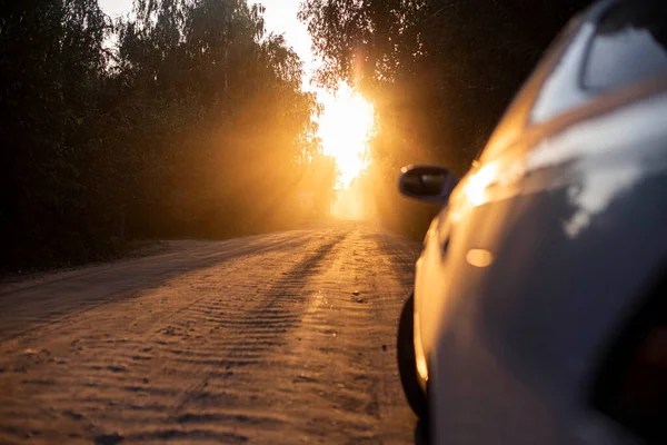 Dusty Dirt Road Beautiful Sunset Forest Front Background Silhouettes Cars — Stock Photo, Image