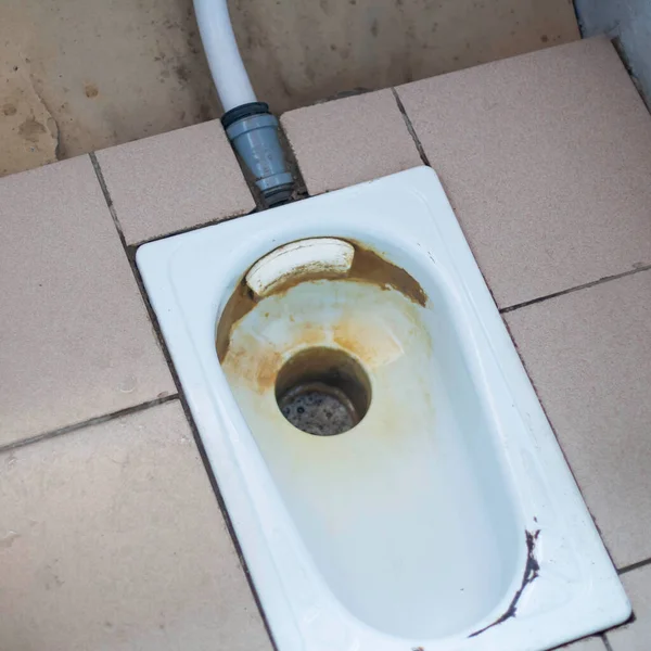 Old Public Floor Standing Toilet Broken Tiles Rust Foreground Background — Stock Photo, Image