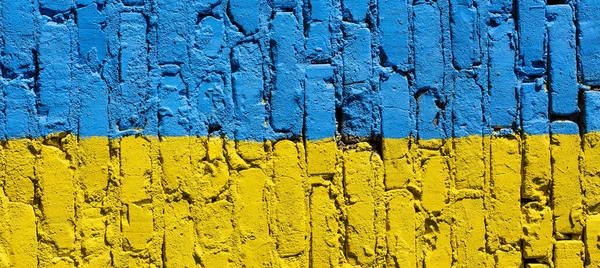 Ukrayna bayrağı arka plan doku tuğla duvara boyalı