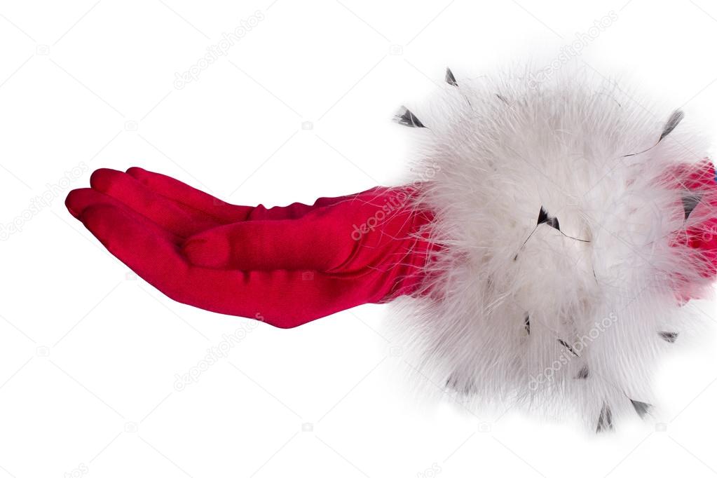 Female holiday hand in the winter Christmas glove with fur