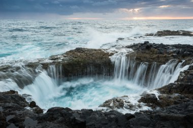 Natural blowhole on the island of Gran Canaria, Spain clipart