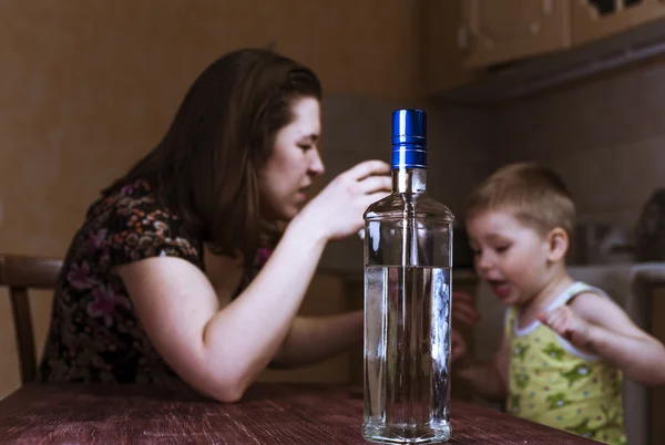 Quarrel between drunk mother and her little son