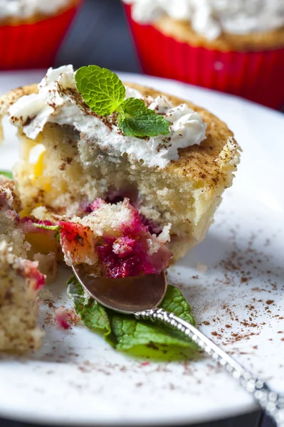 Muffin with cherry and pineapple, silver spoon — Stock Photo, Image