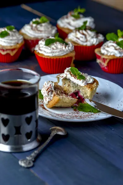 Cupcake with cherry and pineapple on white plate — Stock Photo, Image