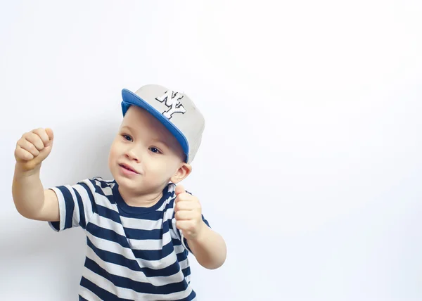 Little handsome boy in t-shirt and cap — Stock Fotó