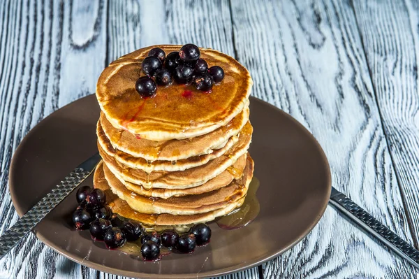 Stack of homemade pancakes with butter and honey — Stock Photo, Image