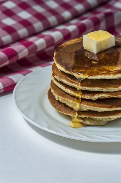 Stack of homemade pancakes with butter and honey — Stock Photo, Image