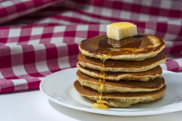 Stack of homemade pancakes with butter and honey — Stock Photo, Image