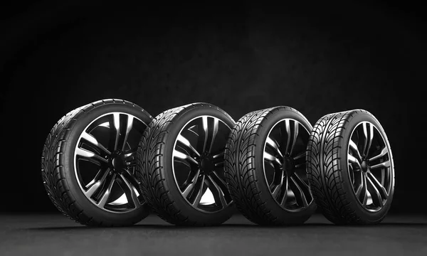 Four car wheels on the asphalt on a black background. 3D rendering illustration.