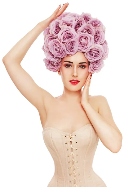 Beautiful woman in wig of roses — Stock Photo, Image