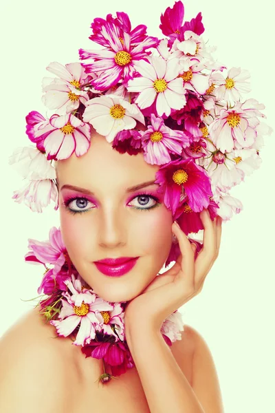 Girl with stylish make-up and colorful flowers — Stock Photo, Image