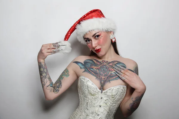 Portrait Beautiful Tattooed Young Woman Santa Hat Corset Fancy Makeup Stock Photo