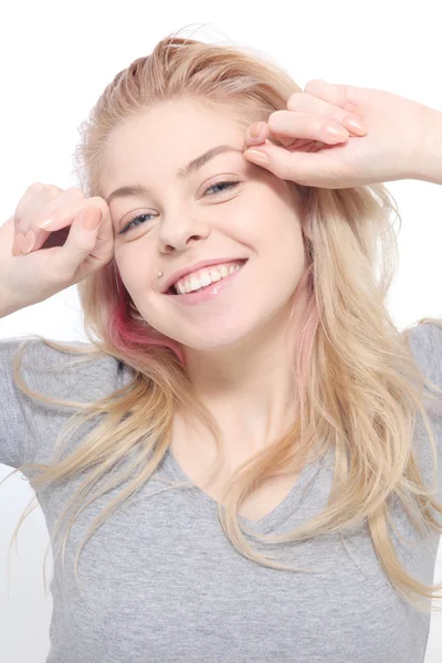 Smiling young blond girl waking up — Stock Photo, Image