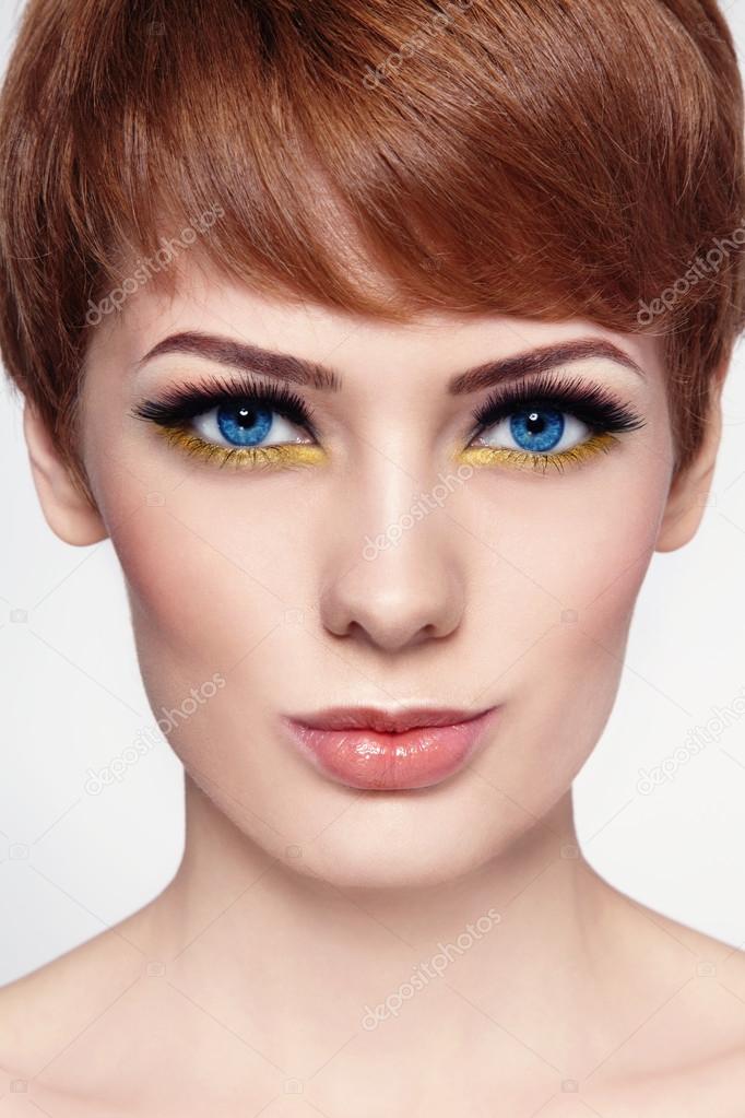 woman with stylish hairstyle and make-up