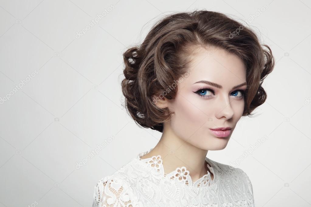 woman with curly prom hairdo