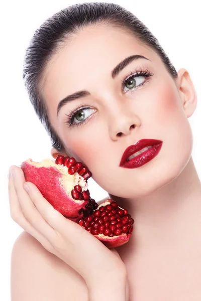 Mooie vrouw met granaatappels — Stockfoto