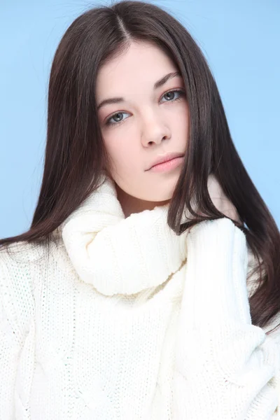 Beautiful girl in white pullover — Stock Photo, Image