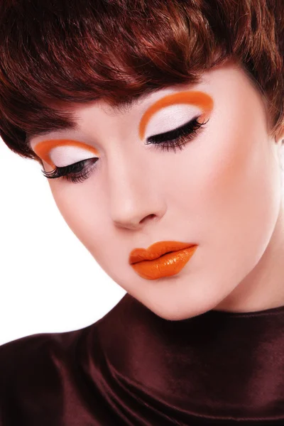 Femme avec maquillage fantaisie orange — Photo