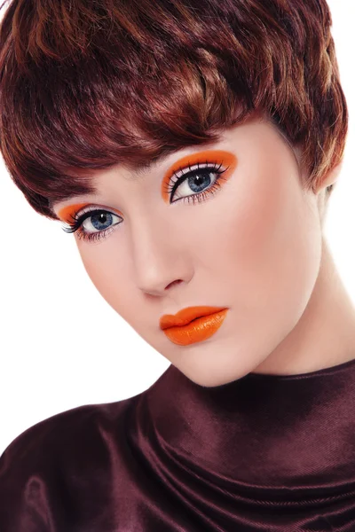 Kvinna med fancy orange make-up — Stockfoto