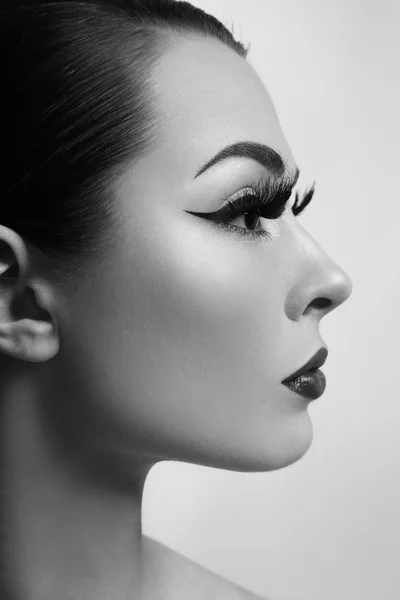 Girl with long false eyelashes — Stock Photo, Image