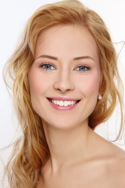 Woman with curly hair and clean make-up — Stok fotoğraf