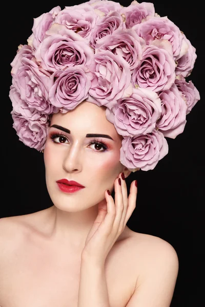 Beautiful woman in fancy flower wig — Stock Photo, Image